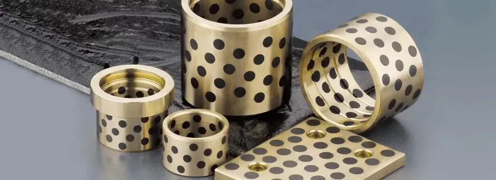 Graphite Plugged Bronze Bushings: Metallurgy, Solid-Lubricant Transfer, and Heavy-Duty Sliding Performance