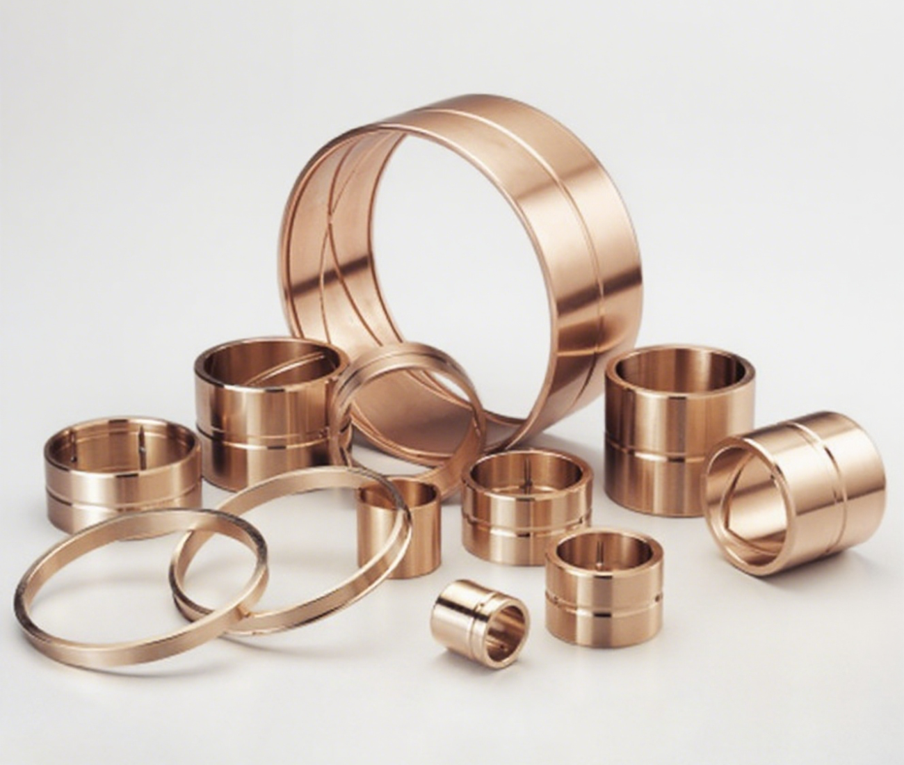 FB092 (such as LD, MBZ-B09, BRO-MET, etc.) Wrapped bronze bushing with good self-lubrication and wear-resisting properties, used in industrial equipment.