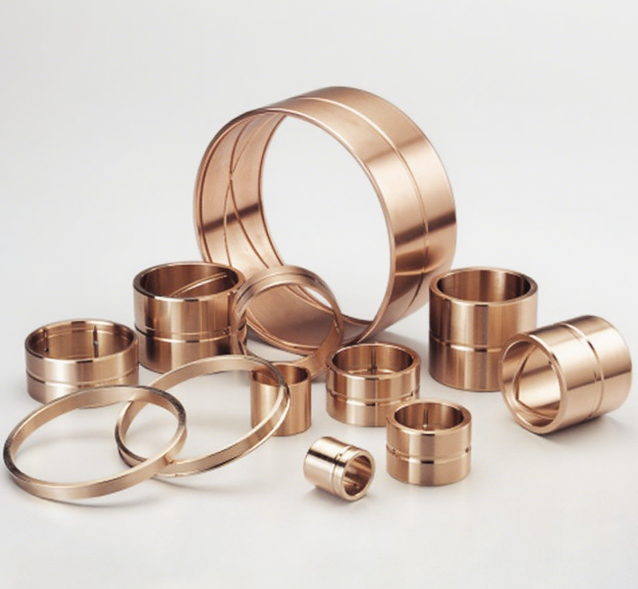 FB092 (such as LD, MBZ-B09, BRO-MET, etc.) Wrapped bronze bushing with good self-lubrication and wear-resisting properties, used in industrial equipment.